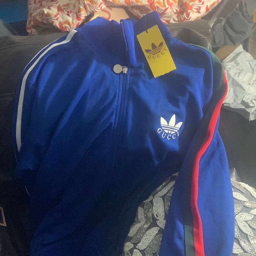 Gucci and Adidas collaboration jumpsuit